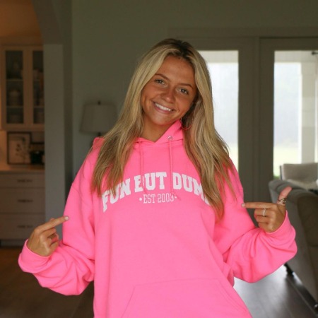 Sadie Cromwell with her hoodie merchandise. 